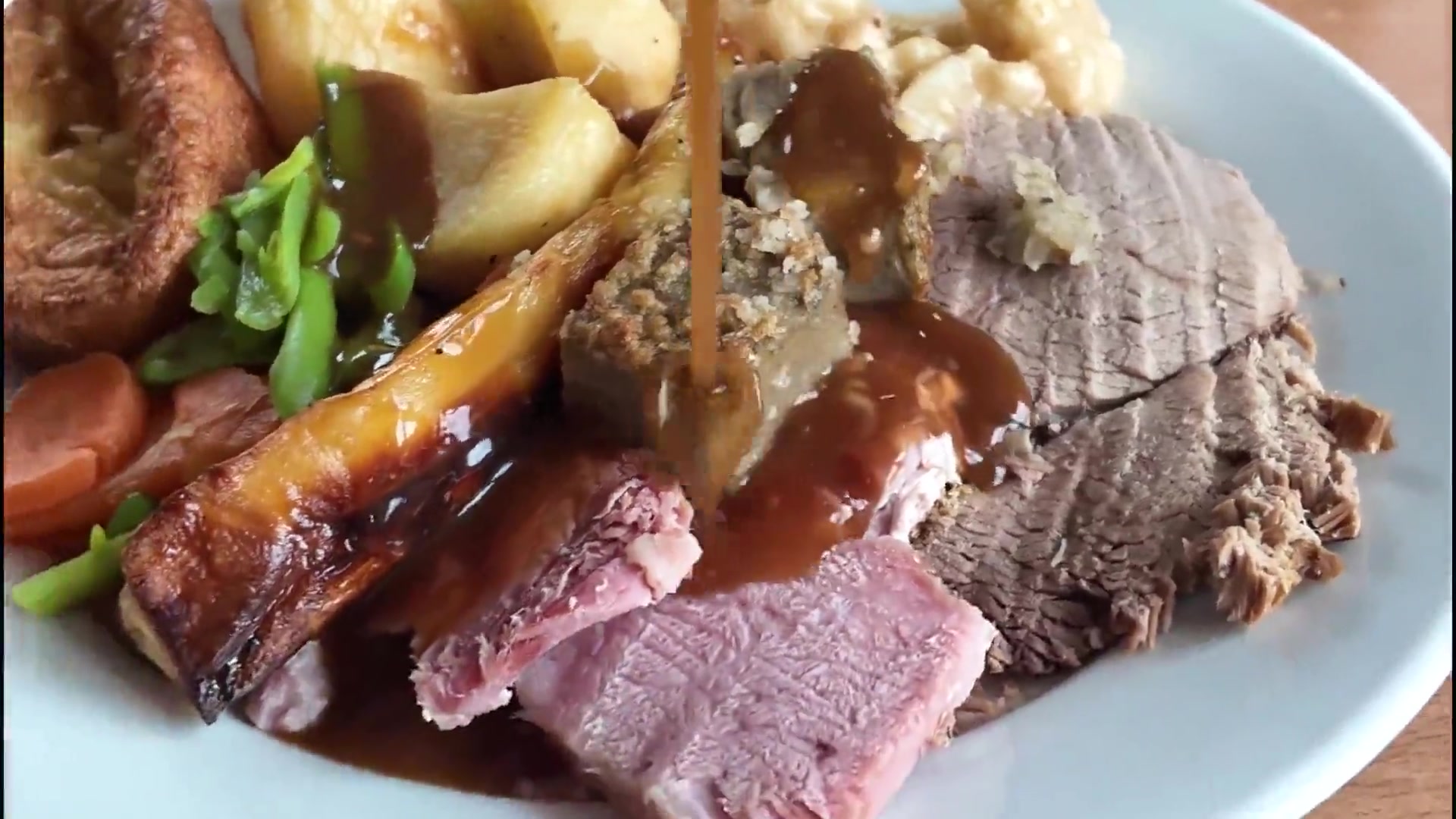 The carvery counter at The Windy Ridge — roast meats, golden roast potatoes, cauliflower cheese, carrots and green beans